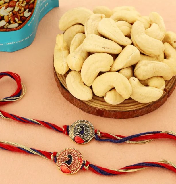 Peacock Charm Rakhi Duo with Nutty Delights